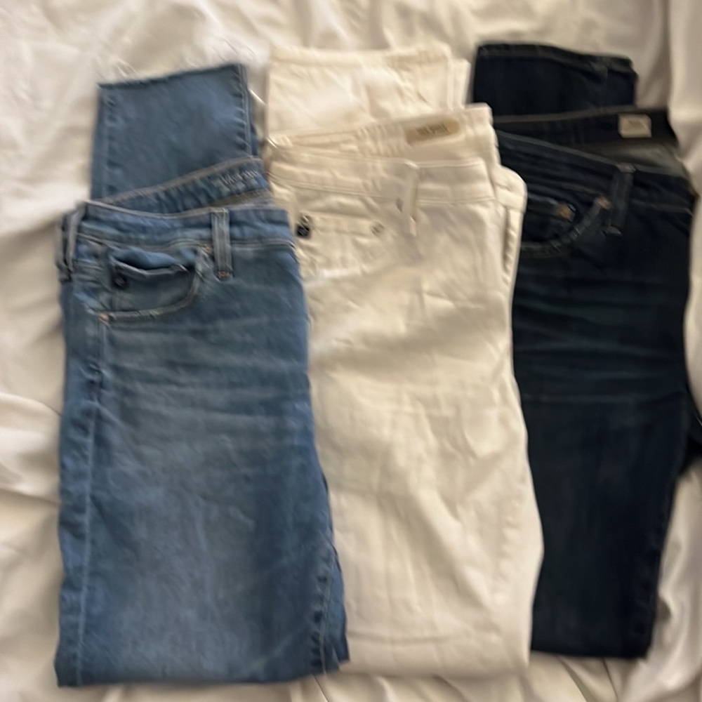 3 X BUNDLE Ag Jeans Size 31 light, medium was and white.